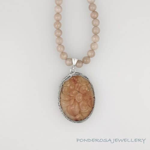 Carved Stone Carved Stone Pendant with Moonstone